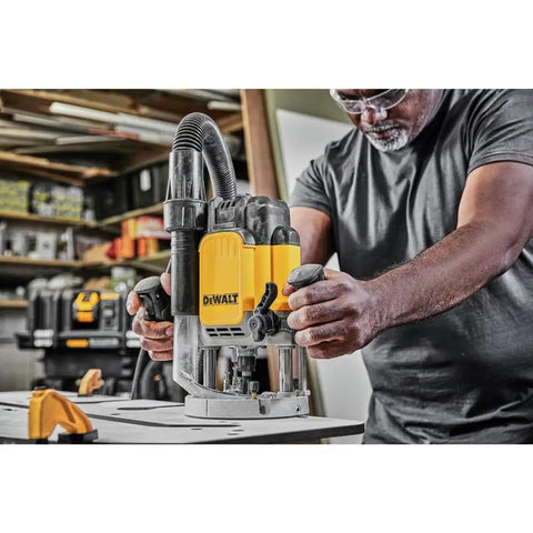 Robust 15 Amp Corded Plunge Router Equipped With Built In Led And Spindle Lock Delivers Badass Routing Power, shown in use.