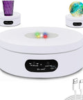 YVV Rotating LED Display Stand With Colorful Lights Spinning Platform Electric Turntable For Jewelry Glass Art Watches Collectibles 4.72 Inch White base with controls and colorful lights.
