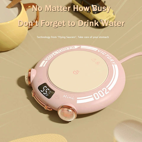 Keep Your Brew Sizzling On Your Sweet Desk Setup With This Aluminum Alloy Cup Warmer Featuring Three Heat Levels And Integrated Auto Shutoff Safety Up To 167 Fahrenheit For Cozy Mornings And Lowkey Amazing Office Vibes In Classic Pink, showcased with a digital display.