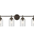 Four Light Vanity Light In Olde Bronze With Clear Seeded Glass Above Bathroom Mirror, durable metal, 30 inches, front view.