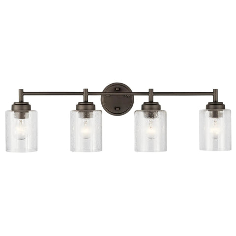 Four Light Vanity Light In Olde Bronze With Clear Seeded Glass Above Bathroom Mirror, durable metal, 30 inches, front view.