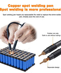 Hands using copper spot welding pen on battery pack with Portable Spot Welder With 1.8 Inch LCD Screen Dual Pulse Welding Machine for 18650 Battery Packs and Cylindrical Cells