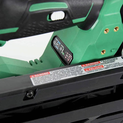 Close-up of 18V MultiVolt Cordless Framing Nailer Kit with 30-Degree Magazine showing control panel and warning labels.