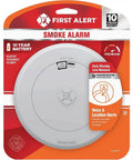Front view of Ten Year Battery-Powered Photoelectric Smoke Detector With Voice And Location Alerts, Easy Test Button, Carded Package, Model SM210V, Reliable Fire Safety Sensor For Home Or Apartment.