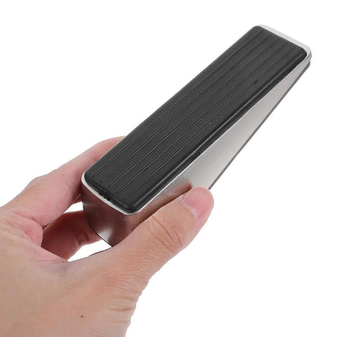 2 Pack No Drill Door Stop Wedges For Home And Office, Heavy Duty Zinc Alloy And Rubber, Easy Install Silver Door Wedge in hand