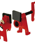 Two red Bessey BPC-H34 3/4-inch H-style pipe clamps with black jaws and screw handles