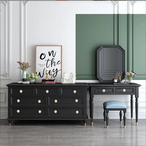 Elegant room with black dresser and vanity, decorated with vintage style, featuring drawers with White Ceramic Cracked Cabinet Handles Set of 10.
