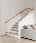 Rock Solid Oak Wood Indoor Stair Banister Rail With Wall Mounted Handrail And Heavy Duty Metal Brackets Hella Durable Finish in a modern living space.