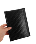60 Pack Black Self-Sealing Bubble Mailers With Tear-Resistant PET Padding For Electronics And Cosmetics in hand