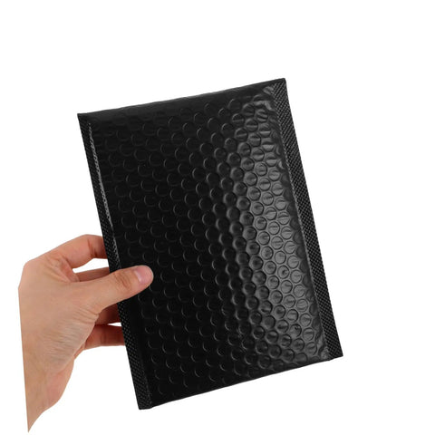 60 Pack Black Self-Sealing Bubble Mailers With Tear-Resistant PET Padding For Electronics And Cosmetics in hand