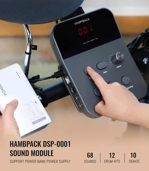 Person adjusting sound module for Electric Drum Set For Beginners And Kids That Slaps With 7 Inch Quiet Mesh Pads