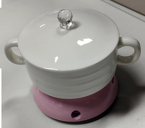 Top Shelf Electric Coffee Mug Warmer With Smart Temp Controls And Four Hour Auto Shutoff Stays Put On Your Desk, white and pink design for hot drinks.