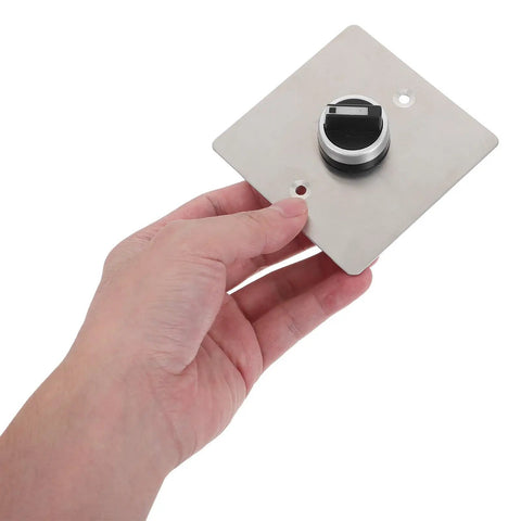 Built Like A Tank Stainless Steel Three Position Selector Switch Panel for Heavy Duty Industrial Machinery Control held in hand.