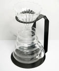 Premium Black Iron Coffee Dripper Holder With Heavy Duty Filter Stand, clear dripper on glass server for precise brewing.