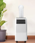 Dual Size Wall Mount Connector For Portable AC Exhaust Hose visible with unit in room setting
