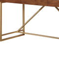 Game Changing Adjustable Standing Desk With Dang Sturdy Gold Metal Legs And Smooth Walnut Top Featuring No Sweat Height Adjustments For Cozy Bedrooms Or Epic Gaming Setups close-up of gold metal legs and walnut top.