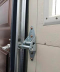 Beefed-Up 1.8-Inch Steel Garage Door Rollers Set For 2-Inch Track Replacement installed on a wooden door showing smooth operation