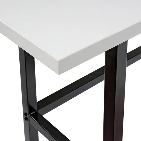 Close-up of Top Shelf Standing Bar Table With Twelve Built In AC Outlets And Sturdy Footrest, showing gray plastic top and black frame.