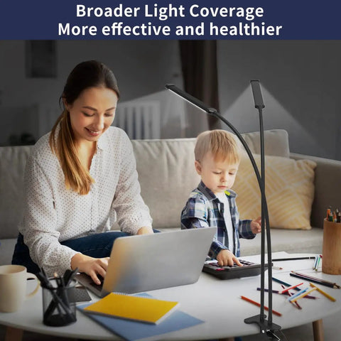 Dual 70cm Gooseneck LED Desk Lamp illuminating a home office with a woman and child using a laptop and tablet