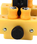 Close-up of a Mini Table Vise Clamp Drill Press Jig showing adjustment screws and yellow grips for small projects.