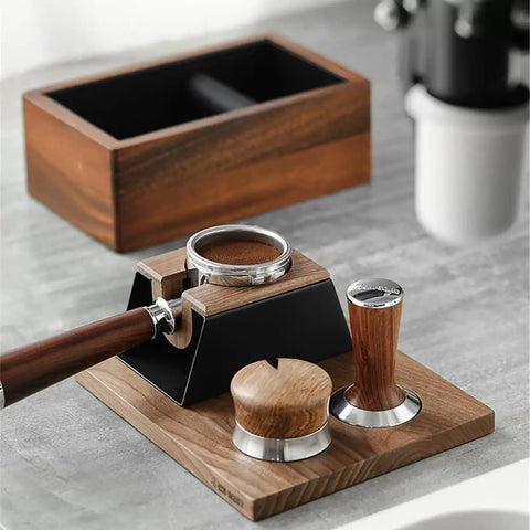 No Fuss 58mm Walnut Wood Espresso Tamper Station And Coffee Press Handle Holder Pro Barista Countertop Organizer displayed on a kitchen counter.