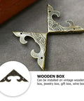 Antique Iron Triangle Corner Guards Set 20 Pcs For Furniture Wooden Boxes, detailed view of iron corner guard with floral pattern.