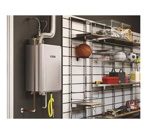 Mad Fast Instant Hot Water Flow Beige Natural Gas Tankless Water Heater mounted on a wall in a garage setting.