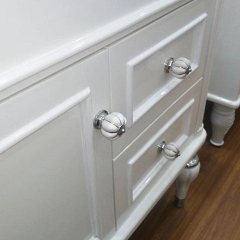 10 Pieces White Ceramic Round Pumpkin Knobs For Cabinets And Furniture, Porcelain Chrome Pumpkin Cabinet Pulls installed on dresser