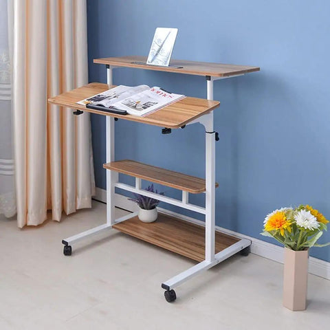 Height Adjustable Overbed Table With Smooth Rolling Casters, Sit To Stand Laptop Desk, Ergonomic Steel Frame Cart For Bed Or Couch, brown tabletop with two adjustable shelves.