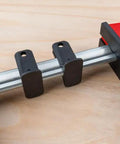 Close-up of KRE3550 50 Inch Parallel Clamp in K Body REVO Series with 1700 lbs nominal clamping force on wooden surface.