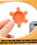Flexible Jaw Coupling Insert With Rubber Spider for vibration dampening, shown in hand for size comparison, orange color gasket accessory