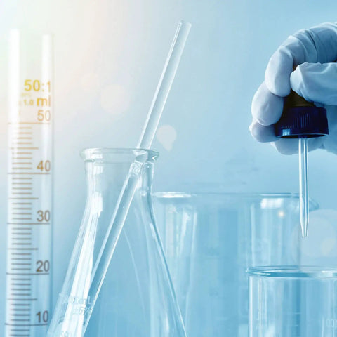 Two Pack Glass Sticks For Electrostatics Experiments Teaching Kit in a lab setting with beakers and measuring cylinder.