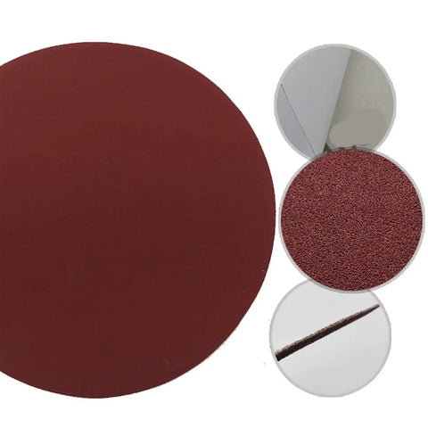 Kick Some Rust And Get That Perfect Gloss With This Awesome 5inch Self-Adhesive Sandpaper Pad Set, Featuring 10 Heavy Duty Discs In 60 To 1000 Grit For Smooth Wood, Paint, Plastic, Leather And More Quick Jobs At Home Or The Shop. Round 5-inch red sandpaper disc shows abrasive texture for use.