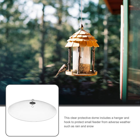 Weatherproof Outdoor Bird Feeder Cover Dome That Hangs As A Protection Shield displayed with bird feeder, forest background