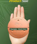 Copper Disc Bird Bath Cleaner For Outdoor Water Fountains And Bowls, 4-inch, shown in hand for size comparison.