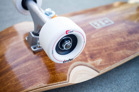 608-RS ball bearing visible in white skateboard wheel mounted on wooden deck; shielded 8x22x7 mm