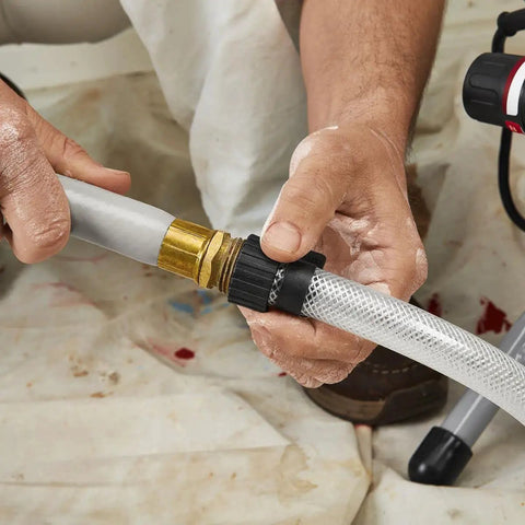Pro Grade Airless Paint Sprayer With A Mean 3000 Psi Kick For Unthinned Latex Primers And Stains Quick Prime Suction Hose connection detail.