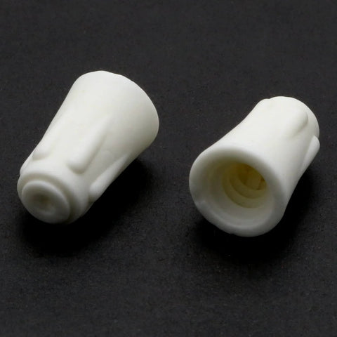 Two white ceramic twist-cap wire connectors for 22-10 AWG electrical wires.