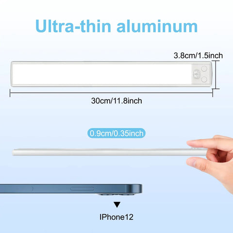Dimensions of Motion Sensor Under Cabinet Lights With 3 Color Temps 106 LED Dimmable USB Rechargeable Strip Lights Magnetic Mount 2200mAh Battery 30cm Length Pack Of 2 Easy Install shown alongside an iPhone 12.