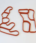 Engine Oil Filter Housing Gasket Set 2721840080 2721840280 For Mercedes Benz M272 Engines red rubber gaskets on white background