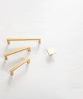 Heritage Designs Contemporary Cabinet Pull 3-3/4 Inch Center to Center Brushed Brass Finish 10-Pack shown on white surface
