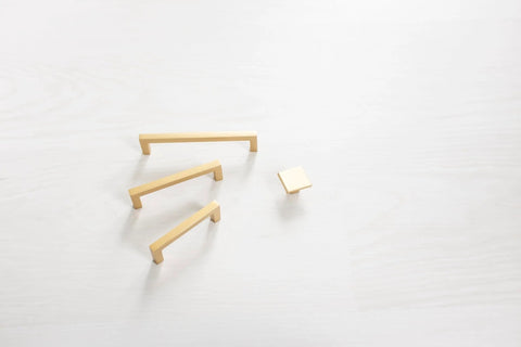 Heritage Designs Contemporary Cabinet Pull 3-3/4 Inch Center to Center Brushed Brass Finish 10-Pack shown on white surface