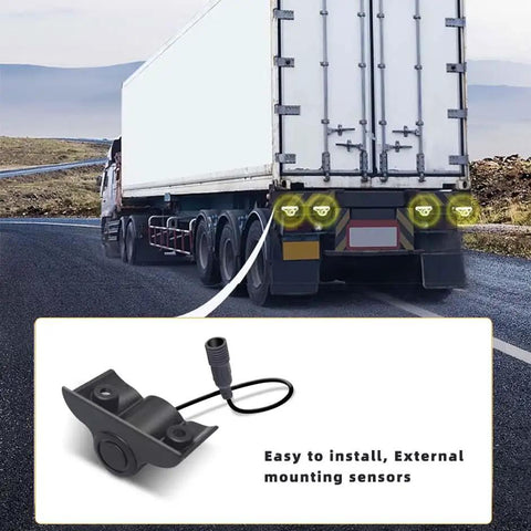 Four Sensor Parking Sensor Kit With Back Up Radar System For Trucks Trailers RVs Vans 24V Distance Detection LCD Alarm External Mounted Sensors 1ft To 7.5ft Easy Install shown on truck rear view