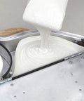 Filling Banjo Dry Tape Holder For Drywall Tapers, Go-To Pro Grade Aluminum Tool with joint compound, showing mud control knob