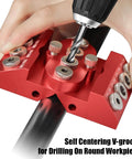 Pro Grade 30 45 90 Degree Drill Guide Jig for Straight Holes with Detachable Bushings in use on round workpiece