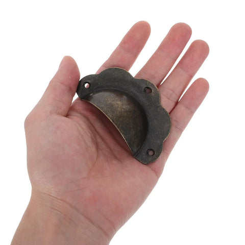 Super Sturdy Vintage Bronze Shell Cup Pulls For Cabinets And Drawers Dead Simple Install Iron Hardware Set held in hand.