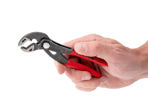 Five Inch Angle Nose Push Button Adjustable Pliers With Quick Adjust Button And Secure Tongue And Groove Track in hand