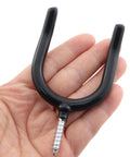 2 Pack Black Wall Mounted U Shaped Hooks For Garage And Warehouse Storage, Heavy Duty Metal Construction With Plastic Covered Surface, Each Hook Supports Up To 20 Pounds, Perfect For Shovels Rakes Hats And Garden Tools. Black U-shaped wall hook with screw mount held in hand