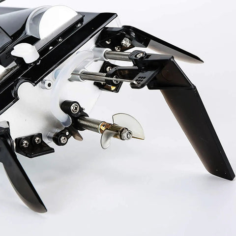 Close-up of the propeller and rudder on the Eighteen Inch Brushless RC Speed Boat With Two Four GHz Remote Control Four Wheel Drive Watercraft