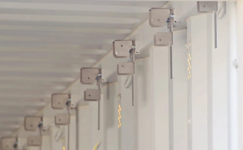 Heavy Duty Interior Wood Stud Framing Brackets For Shipping Containers And Sea Cans Bolt On Wall Mounting Kit, silver aluminum with mounting plates.